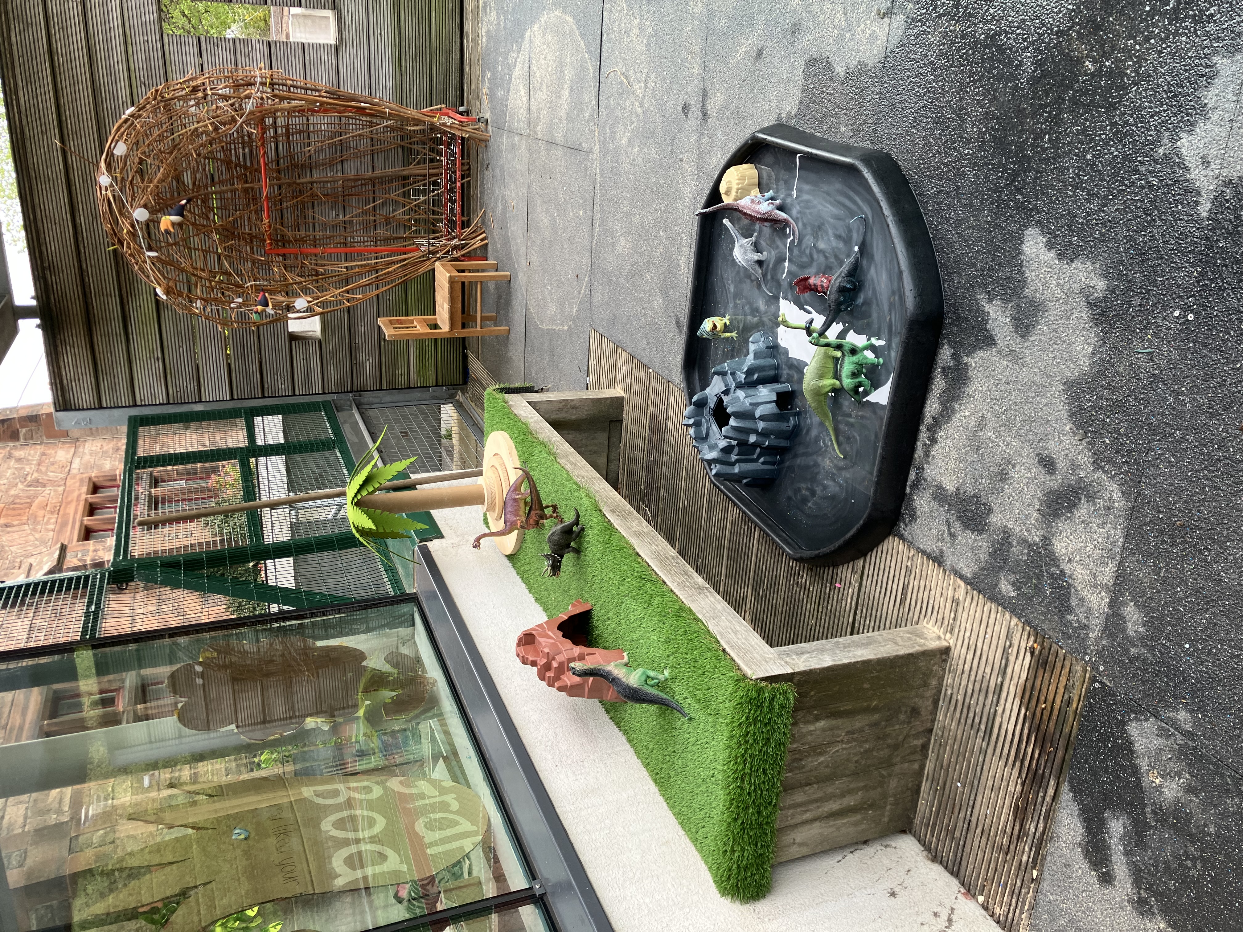 Outdoor nature and dinosaur play at Greenbank Preschool